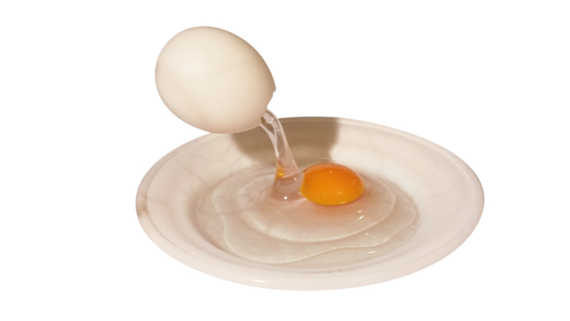 Leaking egg in a plate